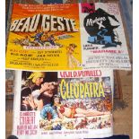 A vintage film poster for "Cleopatra", together with one other for "Beau Geste"