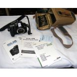 A Canon EOS D30 with manual