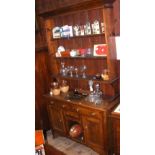 Victorian pine dresser with plate rack over