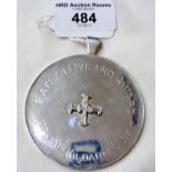 A 6cm diameter silver presentation medallion with pendant mount