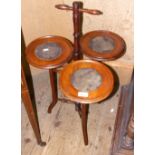 An unusual antique mahogany cakestand on turned support