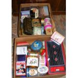 Two boxes containing collectable biscuit tins and other