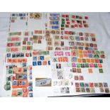Loose album pages containing Great Britain, Queen Victoria and other stamps, many with postmark