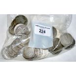 A box of silver two shilling coins