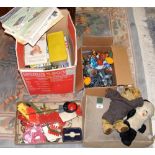 A box of collectable toys, including old Meccano, Teddy Bear