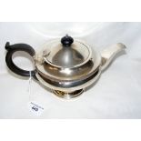 A silver teapot with ebony knob and handle and Birmingham mark