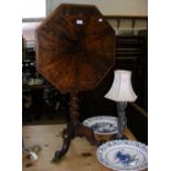 A 19th century walnut snap top occasional table on shaped support