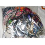 A large bag of assorted costume jewellery