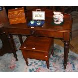 A 19th century mahogany side table on shaped supports