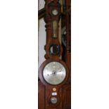 A rosewood cased wheel barometer/thermometer