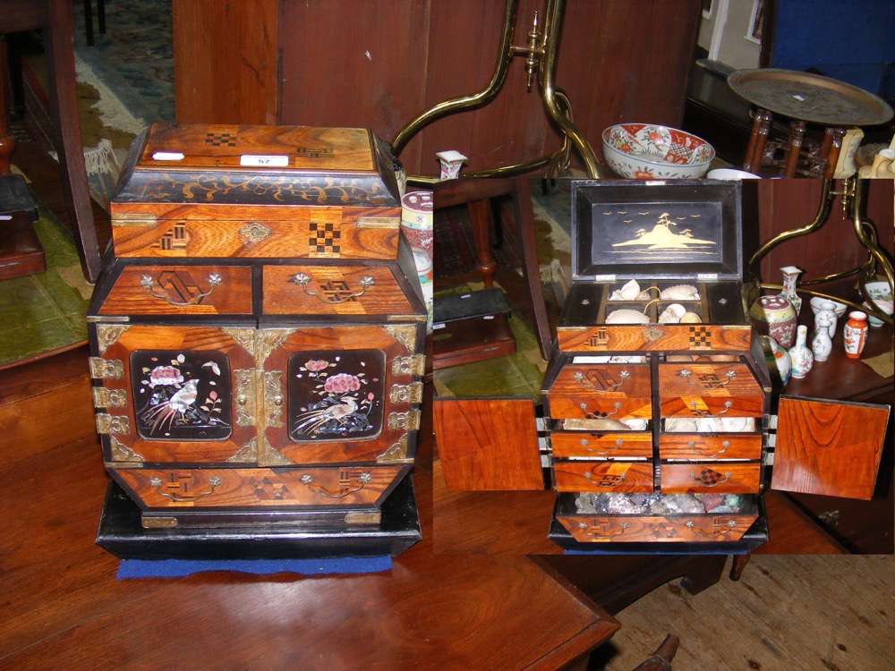 Oriental jewellery box with inlaid decoration, containing selection of shells and rocks