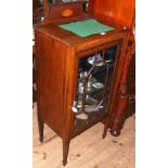 A small Edwardian inlaid mahogany display cabinet with astragal glazed door