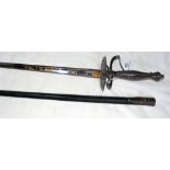 A cut steel hilted court sword with triangular tapering blade, the handle pommel and guard decorated