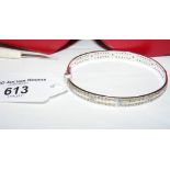 Multi-coloured diamond set bangle in 18ct white gold setting