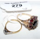 An 18ct gold diamond Solitaire engagement ring and a 9ct gold garnet cluster dress ring