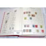 An album containing Commonwealth stamps from 1840-1936