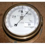 A Kelvin ship's pressure gauge in brass case