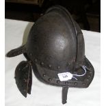 A Cromwellian period Royalist's lobster tailed helmet with plume holder to the back