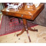 An antique mahogany side table with two drawers to the apron