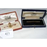 A 14ct gold Infantry brooch and an engine turned 9ct gold pin - both in presentation boxes