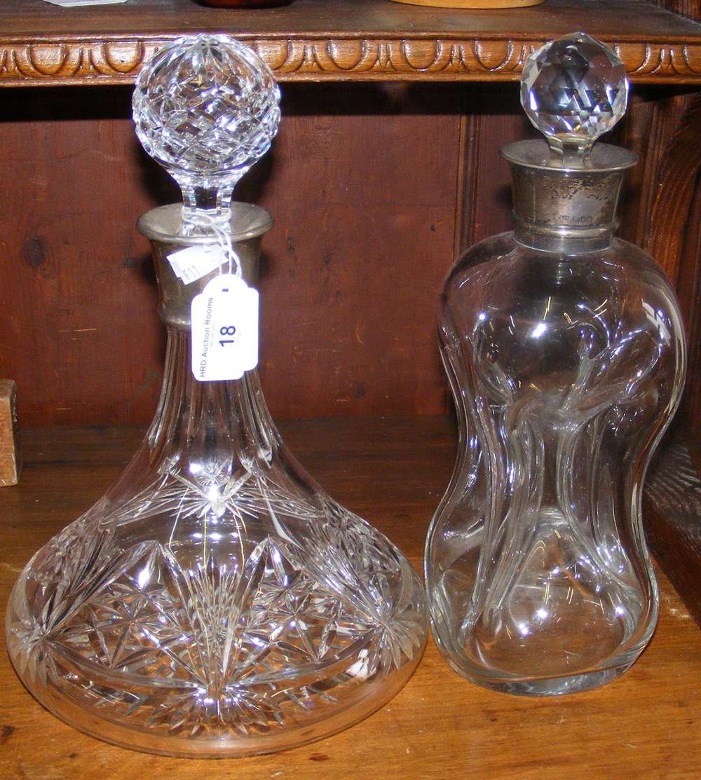 Silver mounted cut glass decanter and stopper, together with one other