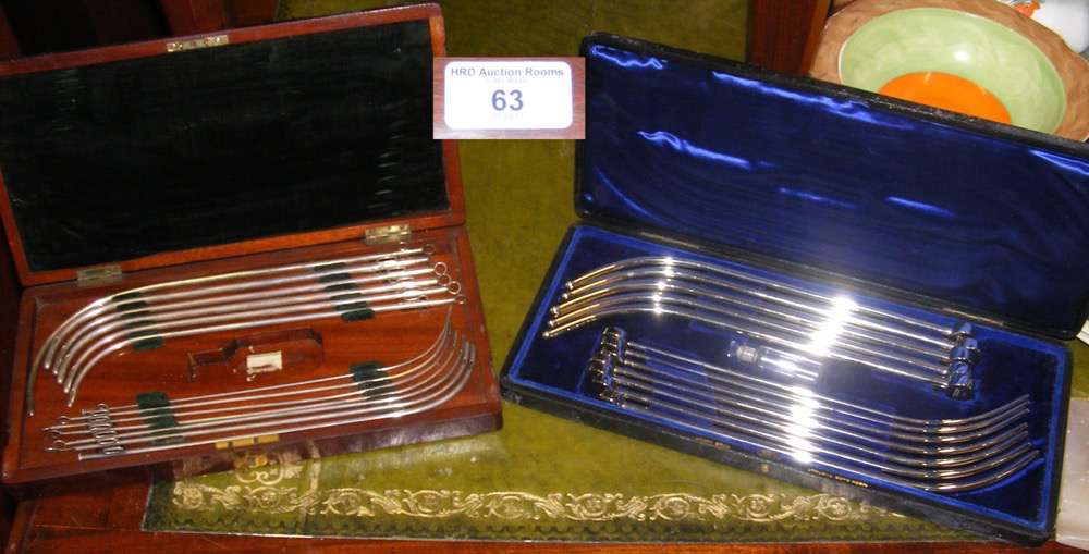 Cased set of medical instruments and one other