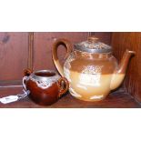 A Doulton Lambeth stoneware teapot with silver mount, together with silver mounted sugar bowl