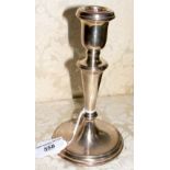 An 18cm high silver candlestick