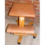 An adjustable back posture desk stool