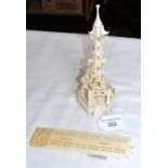 Oriental carved ivory cribbage board and an intricate pagoda