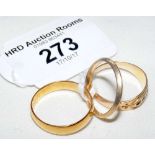 One 22ct and one 9ct gold wedding band and a 15ct gold dress ring