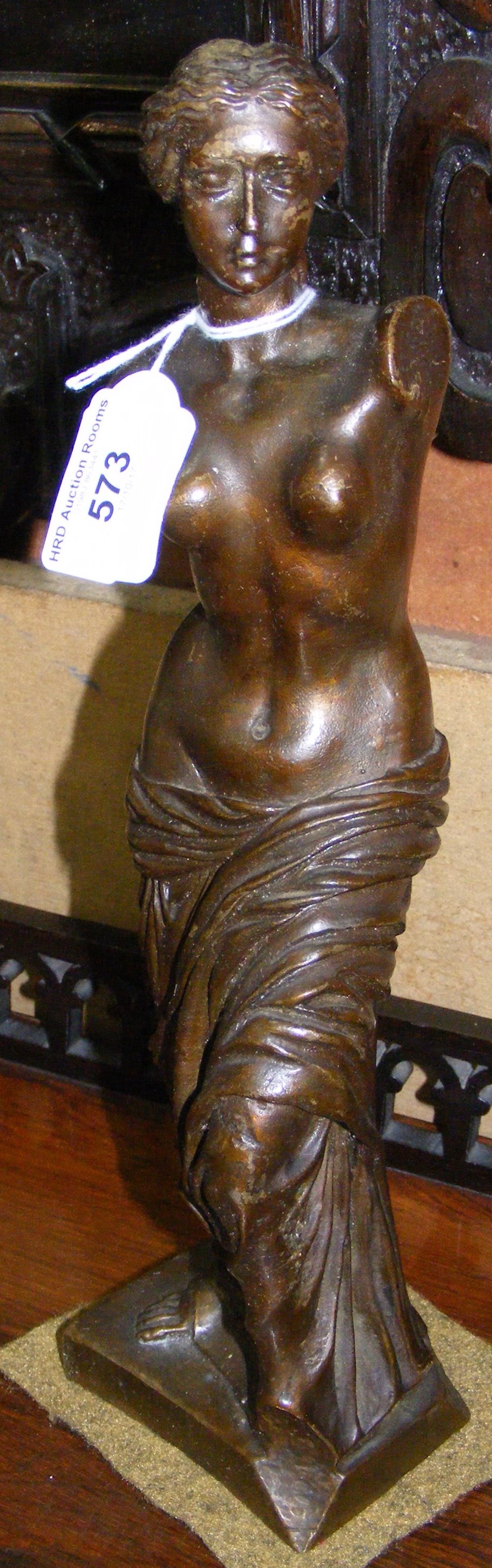 A 33cm high bronze figure of classical Roman lady