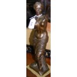 A 33cm high bronze figure of classical Roman lady