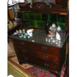An antique marble top washstand with tiled back and drawers below