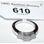 A Princess cut multi-stone diamond ring in platinum setting (approx. .5 carat)