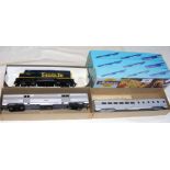 Trains in Miniature - boxed coaches, together with an American locomotive