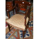 A 19th century antique mahogany curved back armchair