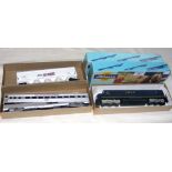 Trains in Miniature - boxed locomotive, together with two boxed freight