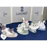 A Lladro figure of cat and frog, together with three others - all boxed