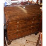 A Georgian mahogany bureau with fitted and inlaid interior, having two short and three long