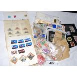A box of Great Britain mint stamps, First Day Covers, early USA stamps, etc.