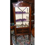 An Edwardian display cabinet with hand painted decoration