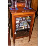 A small Edwardian inlaid mahogany display cabinet with astragal glazed door