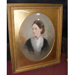 A Victorian oval portrait of a lady in gilt frame