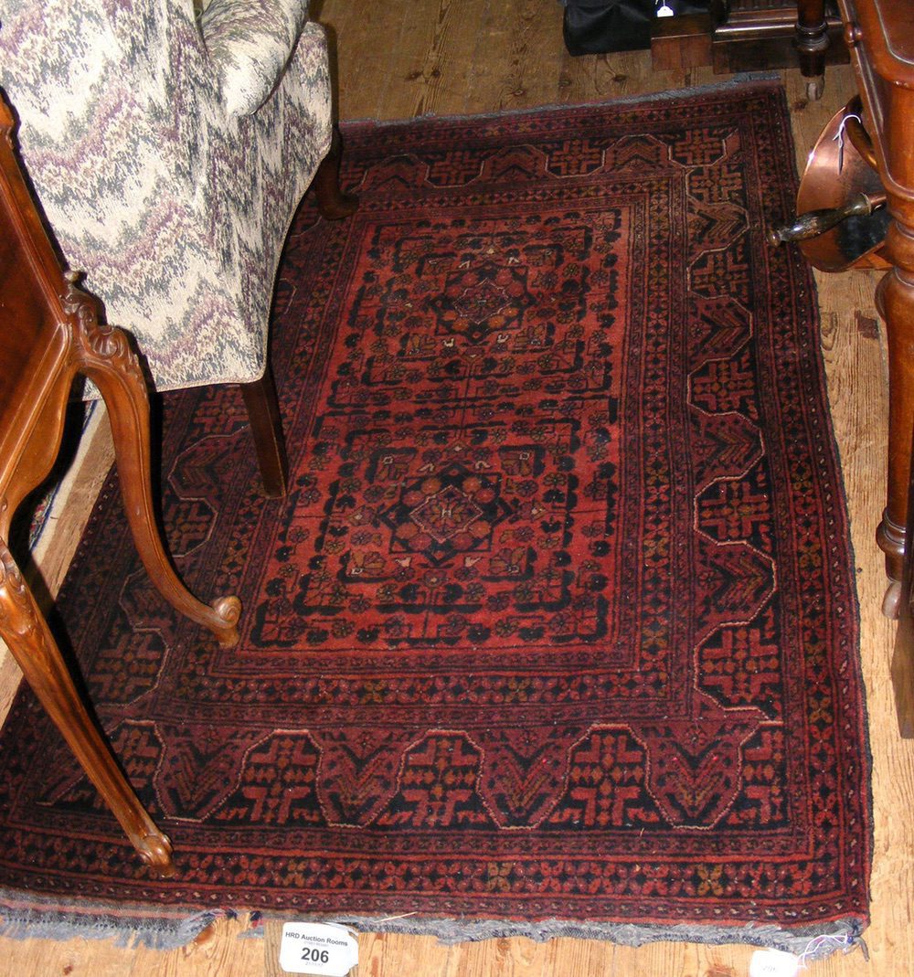 Antique Middle Eastern rug with red ground and geometric border - 160cm x 102cm