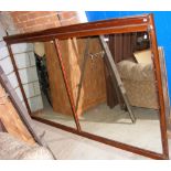 A large mahogany framed mirror