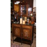 An Edwardian rosewood sideboard with inlaid ivory decoration, having glazed top and drawers and