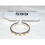 A diamond eternity ring in 18ct gold setting