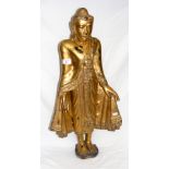 A Thai gilt wood standing figure of Buddha - probably 19th century - 74cm high