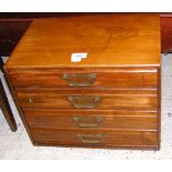 A four drawer collector's chest